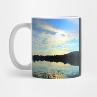 Mystical view with vegetation in the foreground, indistinct waters, Marche hills and azure sky Mug